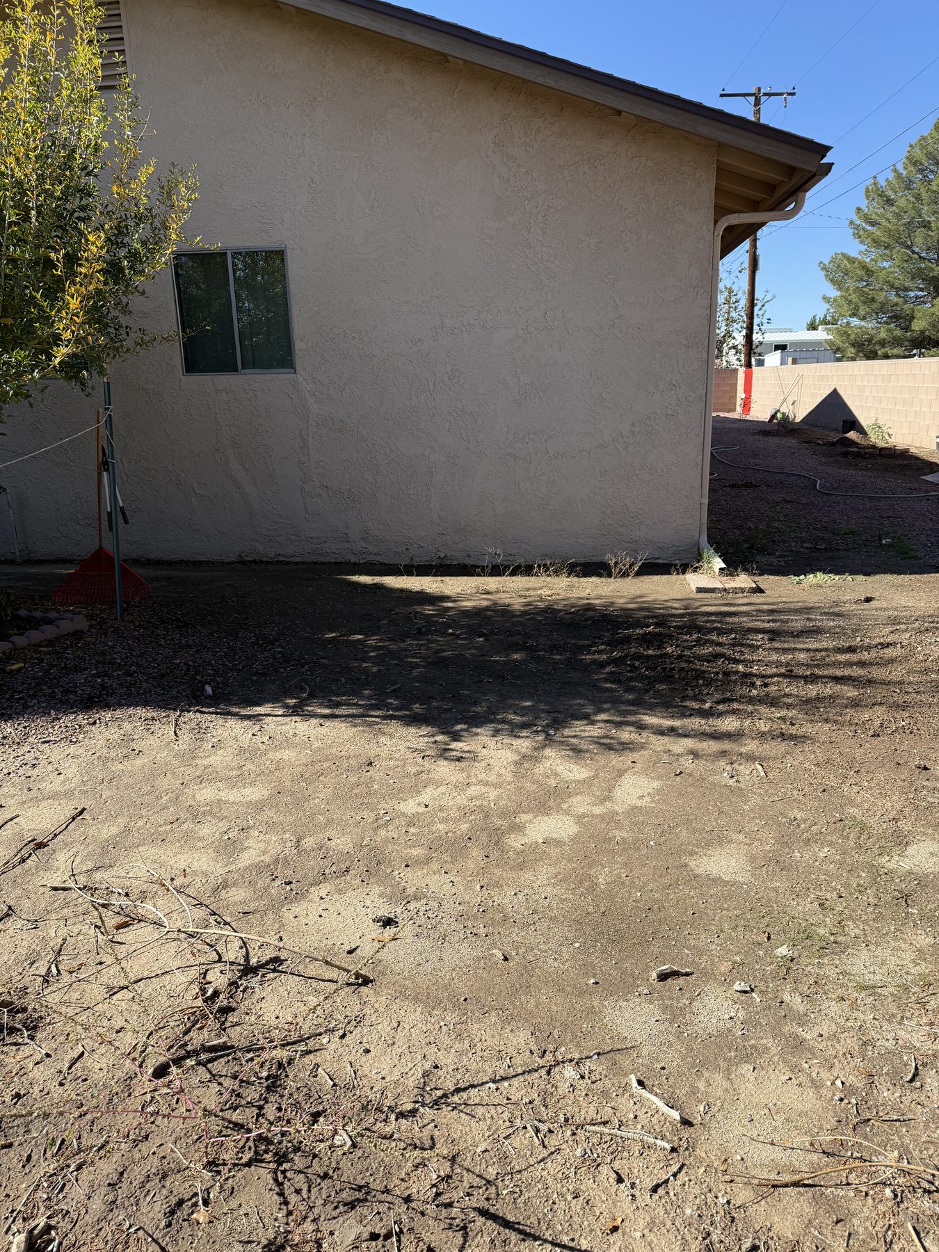 Open yard area ready for rock and gravel improvements