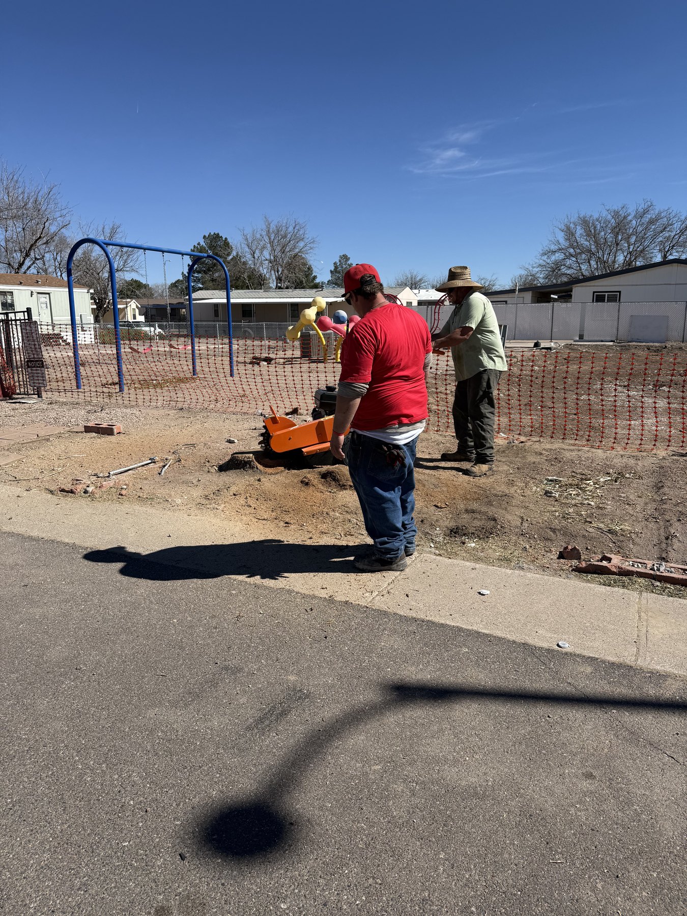 Stump grinding work area prepared at an Arizona property